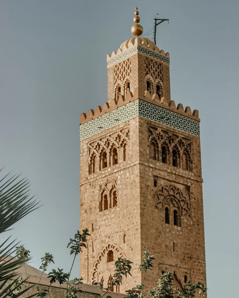 Historic Moroccan minaret with intricate design and decorative details.